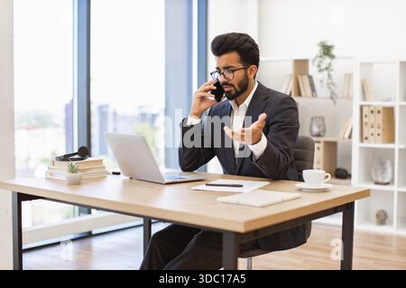 Arab Businessman on Phone Stock Photo