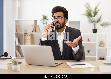 Indian Businessman on Phone Stock Photo