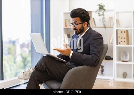Arabian Businessman on Video Call Stock Photo