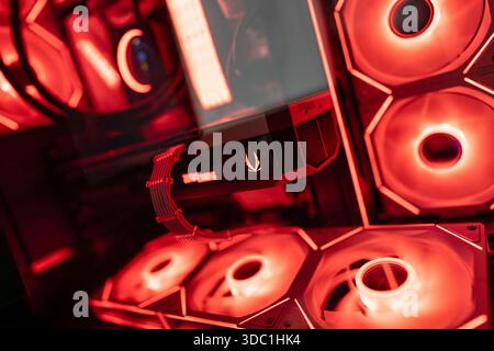 Rovigo, italy 18 december 2025: inside a high-performance computer featuring vibrant red rgb fans and a powerful zotac graphics card, ideal for gaming Stock Photo