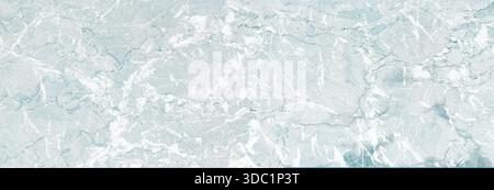 Light blue marble surface with white veins, creating an abstract natural background Stock Photo