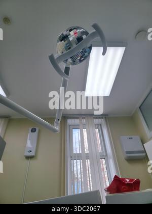 Low angle view of surgical light in dentist's office Stock Photo