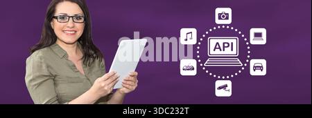 Woman using digital tablet with api concept on background Stock Photo