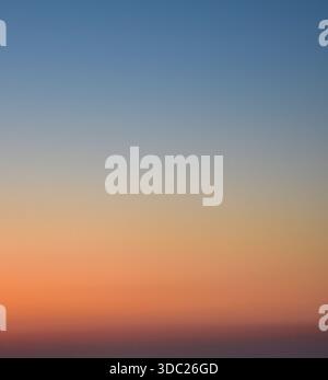 Abstract sunset sky with dramatic tones, creating a clean visual space for design and creative layouts. Stock Photo