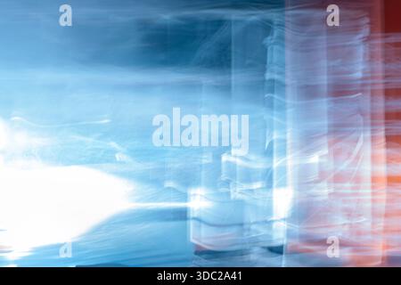Abstract blue and white motion blur background with red accents. Dynamic bright light energy texture. Stock Photo