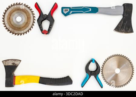 Flat lay of new and used hand tools on white background. Large collection of various tools and bits arranged on white. Stock Photo