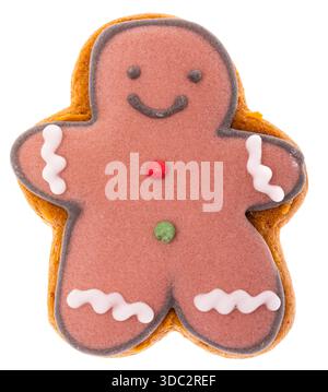 Smiling gingerbread man cookie isolated on white background, decorated with icing and candy buttons for Christmas baking and festive holiday dessert c Stock Photo