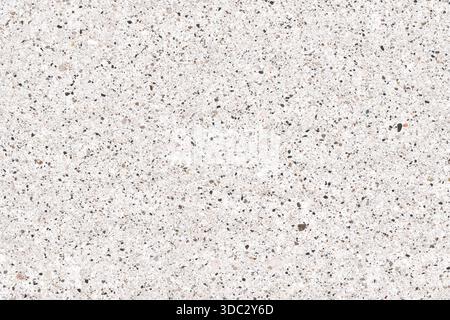 High-resolution of a white terrazzo or quartz surface with multi-colored stone chips and small pebbles. Ideal for architectural and interior design ba Stock Photo