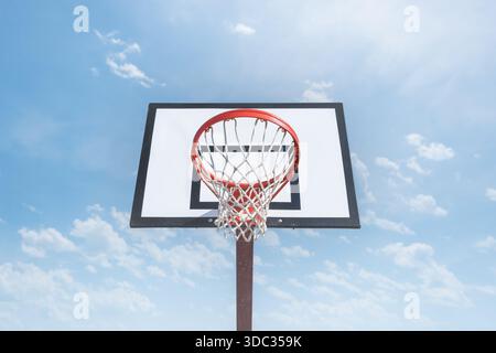 Basketball basket on blue sky background Stock Photo