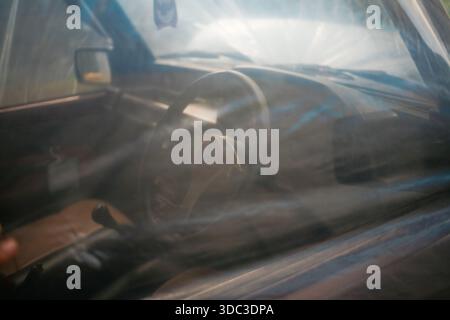 close up of steering wheel car with transparent plastic sheet covered on the body Stock Photo