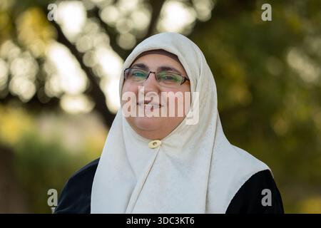 Beautiful Woman Wearing Hijab in The Park. High quality photo Stock Photo