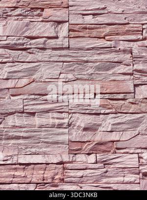 Pink Stone Wall Texture with Natural Stacked Stone Pattern for Modern Architectural Design Copy Space Background Stock Photo