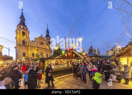 Baroque Christmas market with illuminated angels between the Protestant City Church and the Catholic Church of the Most Holy Trinity. Sights on the ma Stock Photo