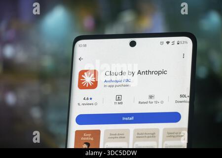 Claude by Anthropic app page on smartphone screen, highlighting AI capabilities with an orange theme Stock Photo
