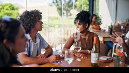 Friends, talk and bonding in restaurant with wine glass, social gathering and fine dining experience. Happy, people and conversation with alcohol at Stock Photo