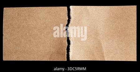 Torn papers on black background Stock Photo