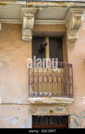 Balcony with rusty iron railing, detail view Stock Photo - Alamy