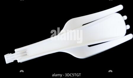 Plastic folding fork on black background Stock Photo