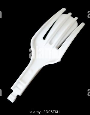 Plastic folding fork on black background Stock Photo