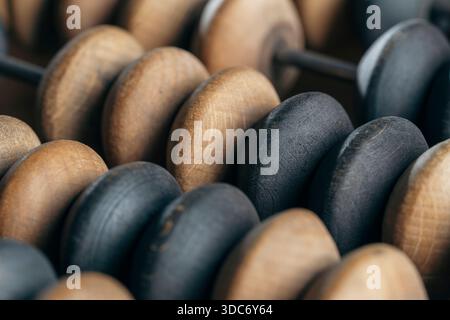 Vintage wooden abacus lying on the table , close up Stock Photo