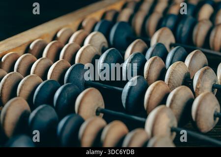 Vintage wooden abacus lying on the table , close up Stock Photo