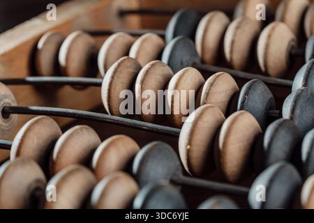 Vintage wooden abacus lying on the table , close up Stock Photo