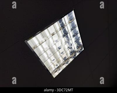 Ceiling light with mercury-vapor bulbs in the interior of modern office Stock Photo