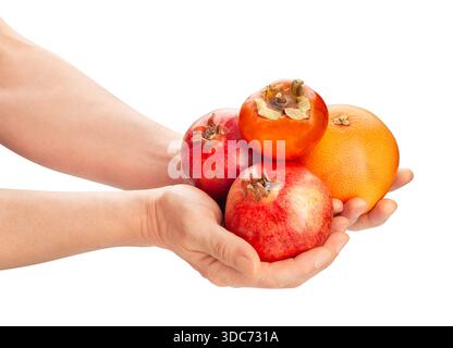 tropcal fruits in hand path isolated on white Stock Photo