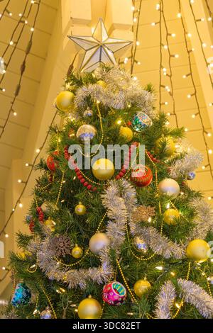 Decorated Christmas Tree with star Stock Photo