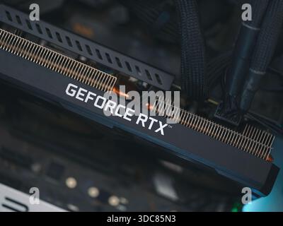 Tambov, Russian Federation - December 13, 2025 Nvidia Geforce RTX graphics card for gaming inside an open computer case. Close up. Stock Photo
