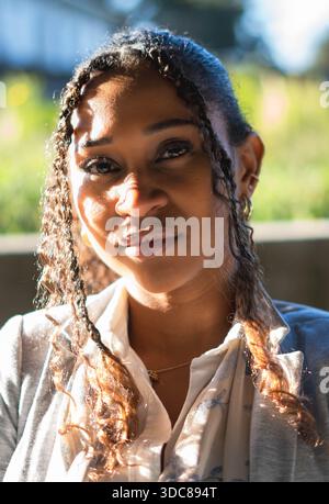 Portrait of Young Woman with Braids Stock Photo