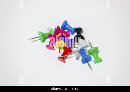 Colourful drawing pins arranged on a neutral background, Germany Stock Photo