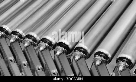 Crossing of the roller conveyor, Production line conveyor roller transportation objects Stock Photo