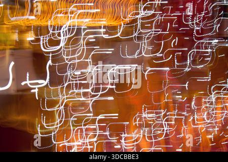 Abstract blurred light, motion effect. Defocused night city scene Stock Photo