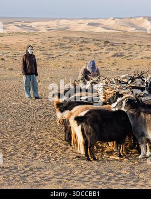 Portrait of a Mongolian goat herder on the steppes, near Hustai ...