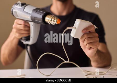 Utilizing a Heat Gun for a Wide Range of Different DIY Projects and Applications Stock Photo