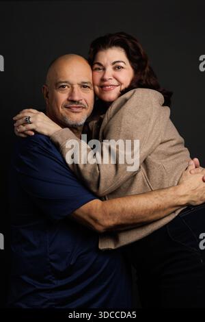 Portrait of adult couple in studio, Latin American ethnicity Stock Photo