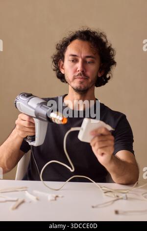 Utilizing a Heat Gun for a Wide Range of Different DIY Projects and Applications Stock Photo
