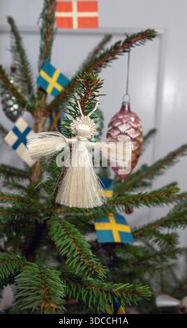 Swedish Christmas tree with traditional decorations Stock Photo