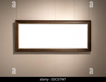 Mockup blank luxury dark brown wooden panoramic frame on gallery wall mockup, ideal for displaying horizontal artworks, photography, or poster designs Stock Photo