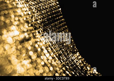 Abstract blurred golden glittering background Stock Photo
