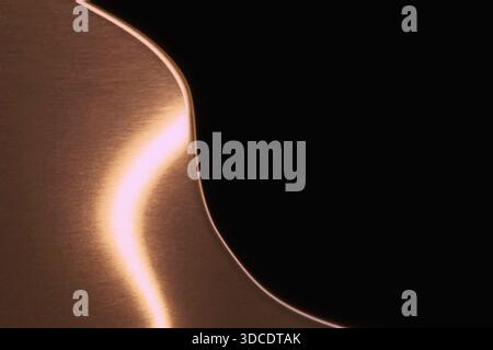 Abstract metalic background, coppercopper plate on the black background Stock Photo