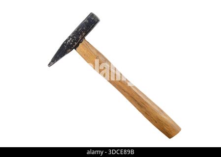Worn metal hammer with peeling black paint and wooden handle isolated on white background. Vintage hand tool showing age, use, and industrial characte Stock Photo