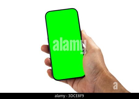 Hand holding smartphone with green screen isolated Stock Photo