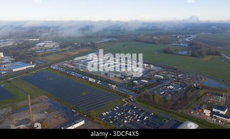 Aerial drone video of the Winschoten data center in The Netherlands, highlighting large-scale cloud computing infrastructure powered by solar energy, Stock Photo