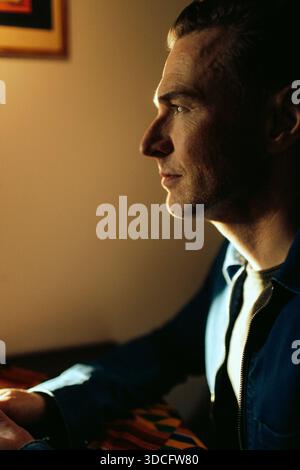 Thoughtful mature man contemplating at restaurant Stock Photo