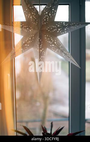 Christmas paper star on the window Stock Photo