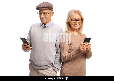 Happy mature man and woman browsing the internet on mobile devices isolated on white background Stock Photo