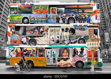 A creative composite image of three stacked buses in Taiwan covered in a photographic collage of local life and culture. Stock Photo