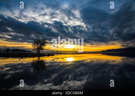 Sunset images on Utah Lake. This area can provide beautiful sunsets and reflections in the water. Stock Photo